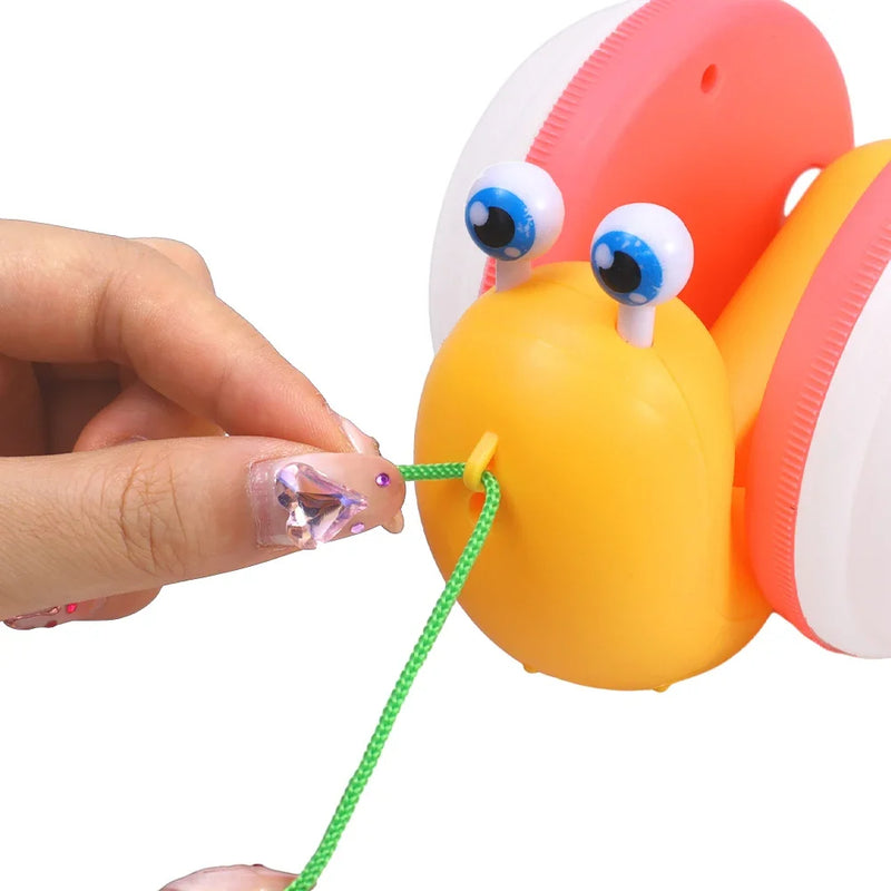 Brinquedo Caracol de Puxar - O Amigo que ilumina as Aventuras do Seu Filho